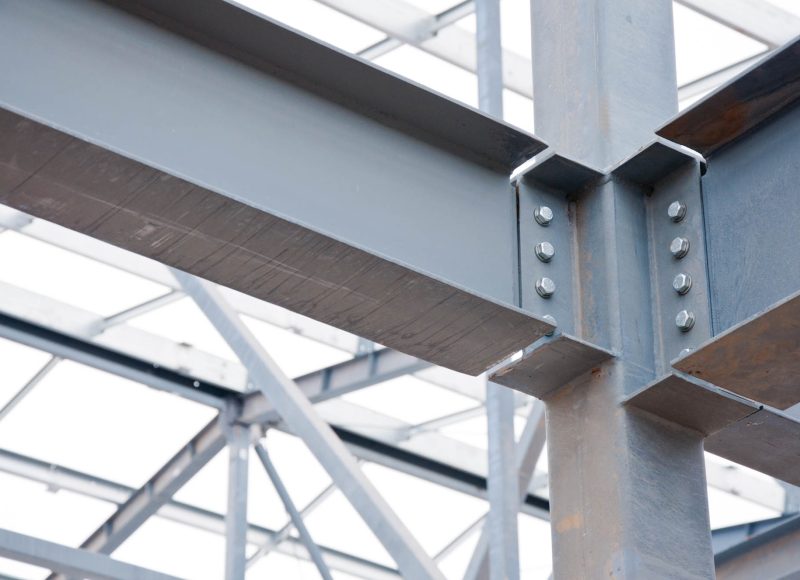 Metal frame of the new building against the sky